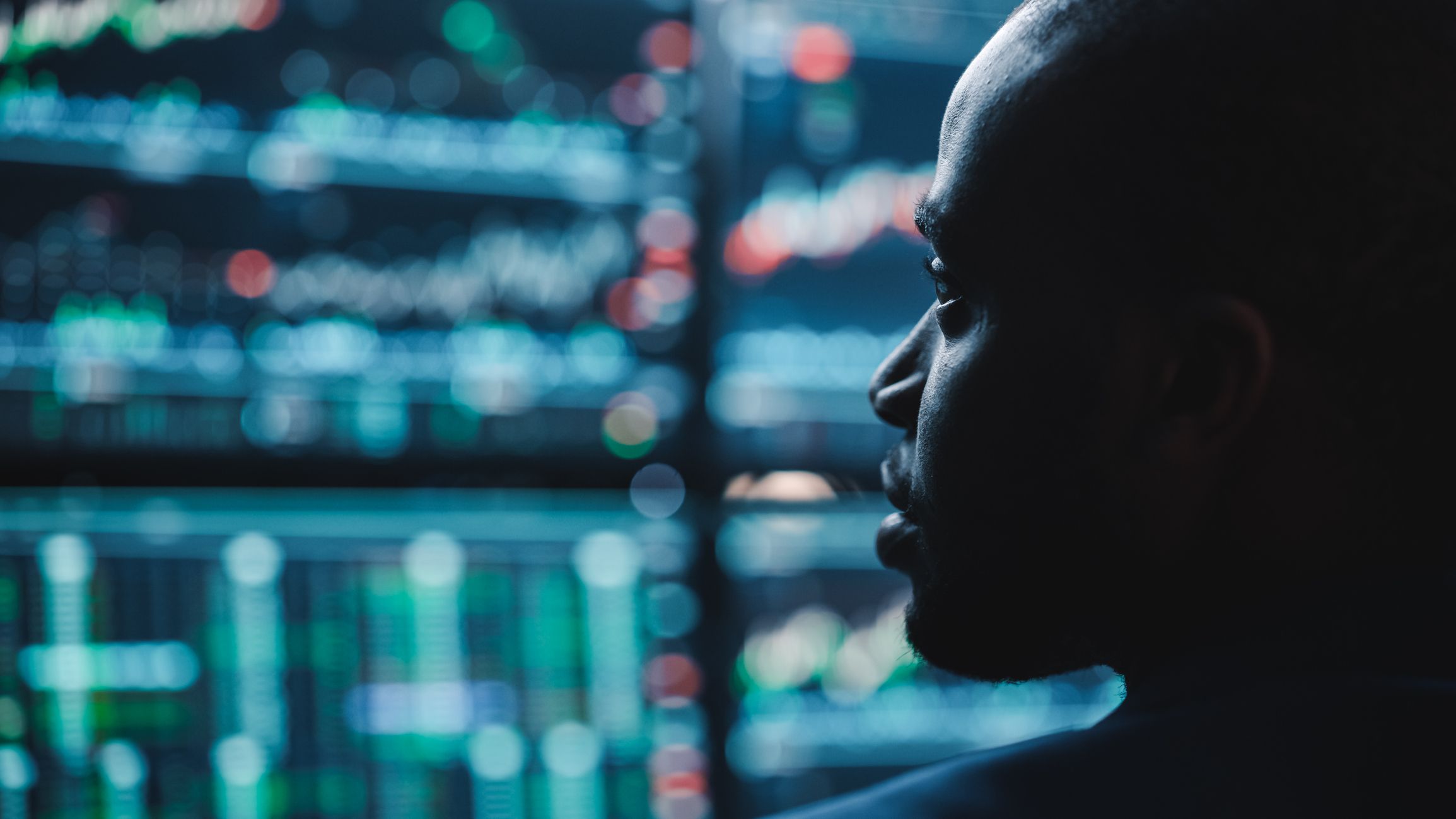 Men looking at trading chart